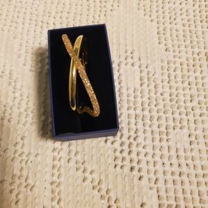 Swarovski bangle bracelet. Gold.